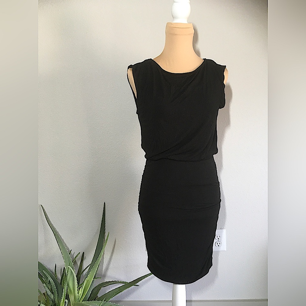 Tight fitting black dress